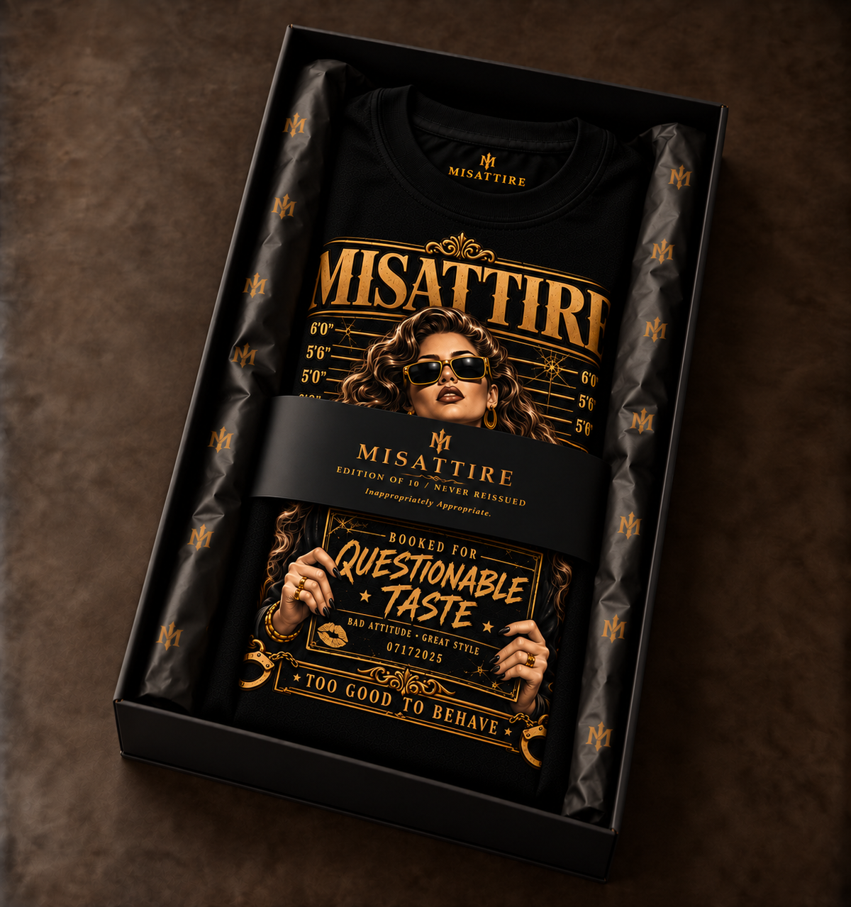 Questionable Taste limited-edition MISATTIRE shirt folded in an open black 17 by 11 inch collector presentation box